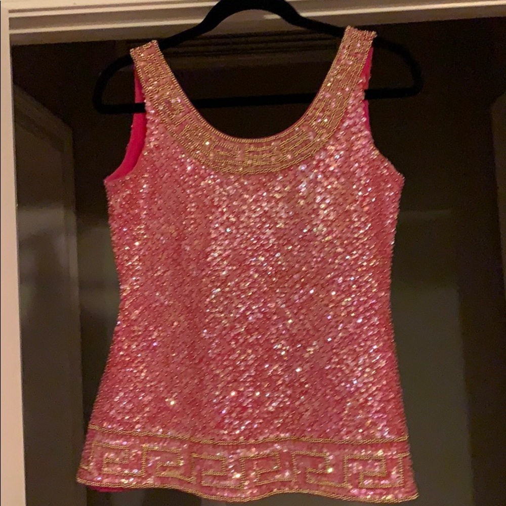 Pink beaded and sequenced top.